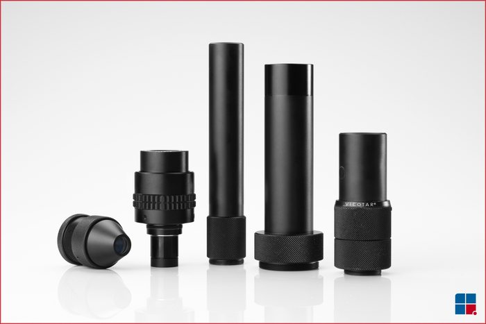 Telecentric magnifying lenses